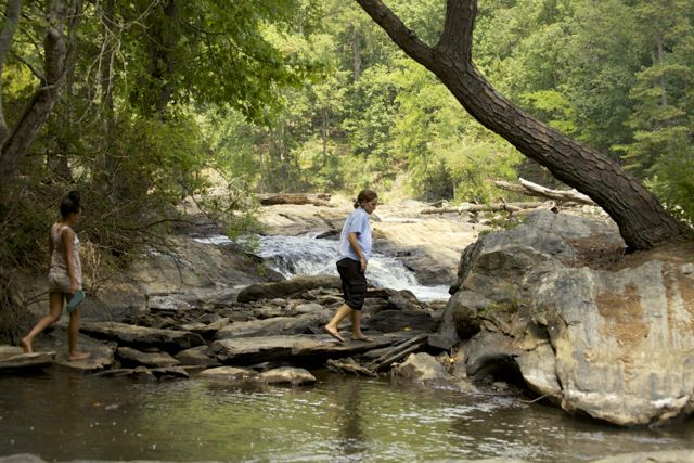 Aliza and Jamie at the stream